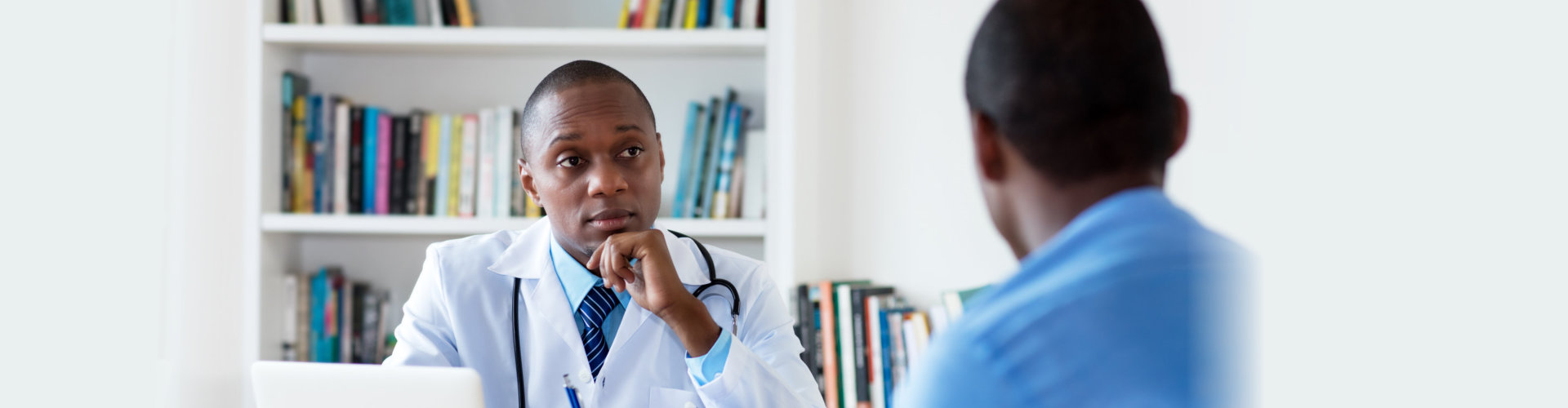 doctor listening to patient