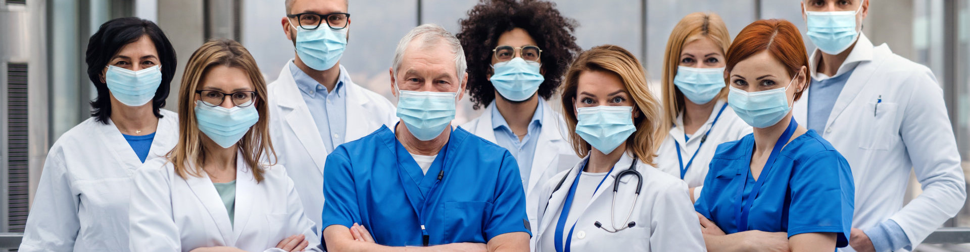 health professionals gathering and posing together